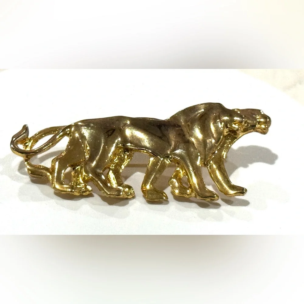 Elegant Gold Lion Brooch
